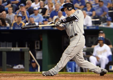 May 27, 2016; Kansas City, MO, USA; Chicago White Sox third baseman Todd Frazier (21) hits a home run against the Kansas City Royals in the sixth inning at Kauffman Stadium. Mandatory Credit: John Rieger-USA TODAY Sports