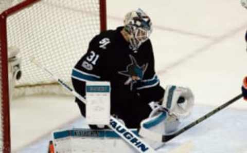 Apr 6, 2017; San Jose, CA, USA; San Jose Sharks goalie Martin Jones (31) catches the puck in his glove against the Edmonton Oilers during the second period at SAP Center at San Jose. Mandatory Credit: Stan Szeto-USA TODAY Sports