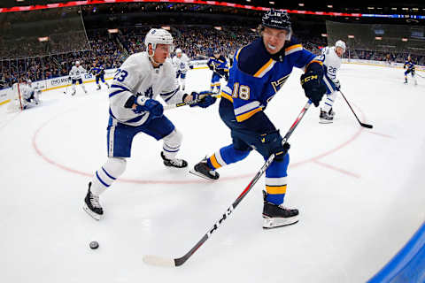 ST. LOUIS, MO – FEBRUARY 19: Robert Thomas #18 of the St. Louis Blues passes the puck against Travis Dermott #23 of the Toronto Maple Leafs . (Photo by Dilip Vishwanat/Getty Images)