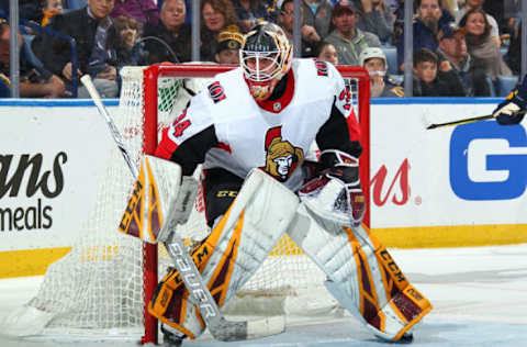 BUFFALO, NY – APRIL 4: Joey Daccord #34 of the Ottawa Senators tends goal during his first NHL game against the Buffalo Sabres on April 4, 2019 at KeyBank Center in Buffalo, New York. (Photo by Sara Schmidle/NHLI via Getty Images)