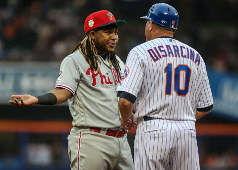 Jul 5, 2019; New York City, NY, USA; Philadelphia Phillies third baseman Maikel Franco (7) and New York Mets third base coach Gary Disarcina (10) at Citi Field. Mandatory Credit: Wendell Cruz-USA TODAY Sports