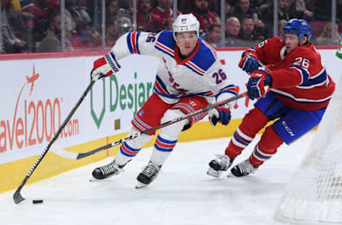 MONTREAL, QC – DECEMBER 1: Jimmy Vesey #26 of the New York Rangers controls the puck while being challenged by Jeff Petry #26 of the Montreal Canadiens in the NHL game at the Bell Centre on December 1, 2018 in Montreal, Quebec, Canada. (Photo by Francois Lacasse/NHLI via Getty Images)