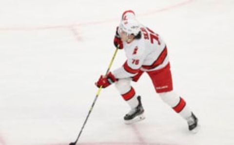 Feb 2, 2021; Chicago, Illinois, USA; Carolina Hurricanes defenseman Brady Skjei (76) controls the puck against the Chicago Blackhawks during the second period at United Center. Mandatory Credit: Kamil Krzaczynski-USA TODAY Sports