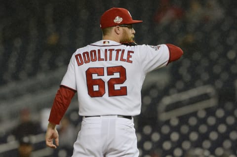 WASHINGTON, DC – SEPTEMBER 24: Sean Doolittle #62 of the Washington Nationals pitches against the Miami Marlins at Nationals Park on September 24, 2018 in Washington, DC. (Photo by G Fiume/Getty Images)