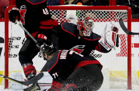 RALEIGH, NC – APRIL 18: Petr Mrazek #34 of the Carolina Hurricanes makes a glove save in Game Four of the Eastern Conference First Round against the Washington Capitals during the 2019 NHL Stanley Cup Playoffs on April 18, 2019 at PNC Arena in Raleigh, North Carolina. (Photo by Gregg Forwerck/NHLI via Getty Images)