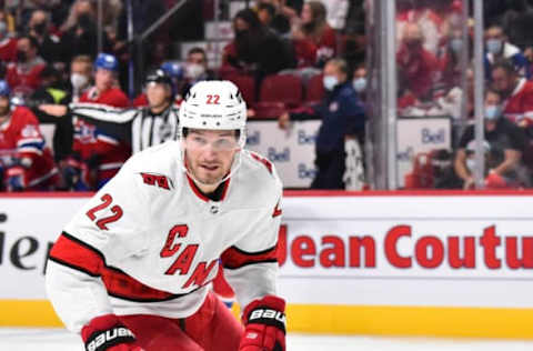 MONTREAL, QC – OCTOBER 21: Brett Pesce #22 of the Carolina Hurricanes skates against the Montreal Canadiens during the second period at Centre Bell on October 21, 2021, in Montreal, Canada. The Carolina Hurricanes defeated the Montreal Canadiens 4-1. (Photo by Minas Panagiotakis/Getty Images)