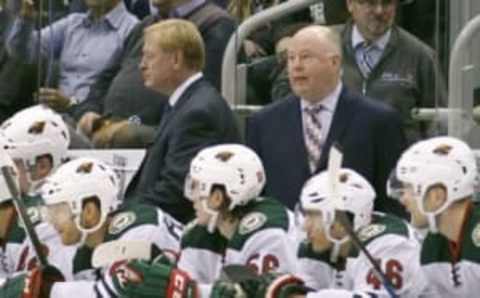 Dec 7, 2016; Toronto, Ontario, CAN; Minnesota Wild head coach Bruce Boudreau (right) on the bench against the Toronto Maple Leafs at the Air Canada Centre. Minnesota defeated Toronto 3-2. Mandatory Credit: John E. Sokolowski-USA TODAY Sports