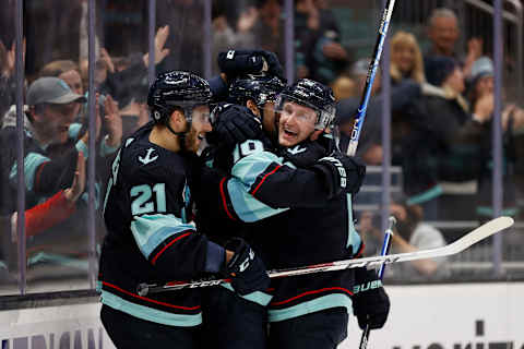 Matty Beniers (10), Jared McCann (16), and Alex Wennberg (21), Seattle Kraken (Photo by Steph Chambers/Getty Images)