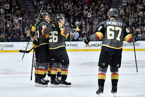 LAS VEGAS, NEVADA – OCTOBER 17: Nick Holden #22 of the Vegas Golden Knights celebrates with teammates after scoring a goal during the first period against the Ottawa Senators at T-Mobile Arena on October 17, 2019 in Las Vegas, Nevada. (Photo by Jeff Bottari/NHLI via Getty Images)