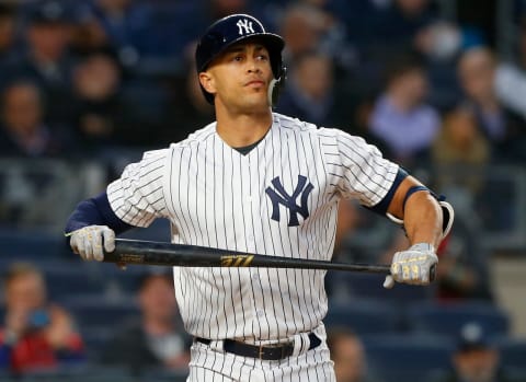 NEW YORK, NY – APRIL 24: (NEW YORK DAILIES OUT) Giancarlo Stanton #27 of the New York Yankees in action against the Minnesota Twins at Yankee Stadium on April 24, 2018, in the Bronx borough of New York City. The Yankees defeated the Twins 8-3. (Photo by Jim McIsaac/Getty Images)