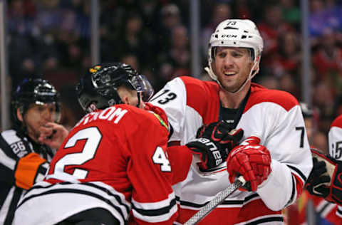 CHICAGO, IL – MARCH 02: Joakim Nordstrom #42 of the Chicago Blackhawks and Brett Bellemore #73 of the Carolina Hurricanes get into a shoving match at the United Center on March 2, 2015 in Chicago, Illinois. The Blackhawks defeated the Hurricanes 5-2. (Photo by Jonathan Daniel/Getty Images)