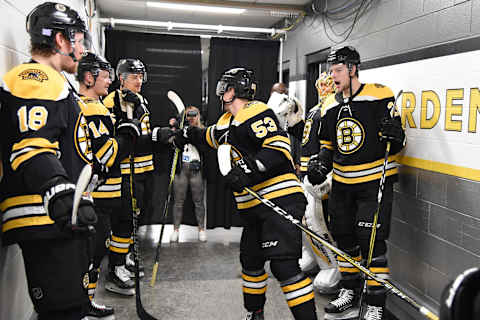 BOSTON, MA – NOVEMBER 4: Cameron Hughes #53 of the Boston Bruins fist bumps his teammates before his first NHL game against the Pittsburgh Penguins at the TD Garden on November 4, 2019 in Boston, Massachusetts. (Photo by Steve Babineau/NHLI via Getty Images)