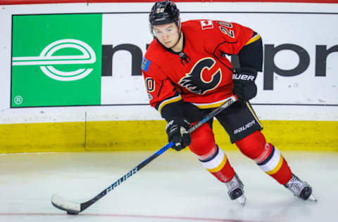 Apr 19, 2017; Calgary, Alberta, CAN; Calgary Flames right wing Curtis Lazar (20) controls the puck against the Anaheim Ducks during the first period in game four of the first round of the 2017 Stanley Cup Playoffs at Scotiabank Saddledome. Mandatory Credit: Sergei Belski-USA TODAY Sports