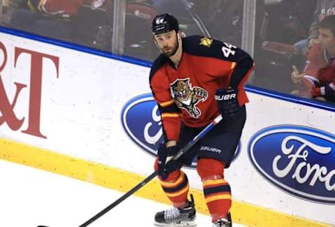 Apr 2, 2016; Sunrise, FL, USA; Florida Panthers defenseman Erik Gudbranson (44) looks to pass the puck in the first period of a game against the Montreal Canadiens at BB&T Center. Mandatory Credit: Robert Mayer-USA TODAY Sports