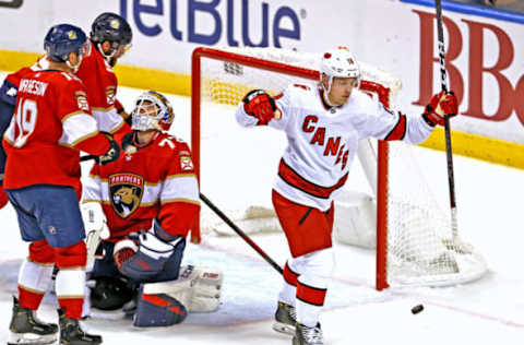 Florida Panthers goalie Sergei Bobrovsky (72) reacts as Carolina Hurricanes center Ryan Dzingel (18) celebrates after scoring a power play goal during the first period of an NHL hockey game at the BB&T Center Tuesday, Oct. 8, 2019 in Sunrise, Fla. (David Santiago/Miami Herald/Tribune News Service via Getty Images)