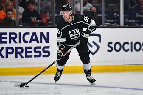 May 8, 2022; Los Angeles, California, USA; Los Angeles Kings defenseman Troy Stecher (51) controls the puck against the Edmonton Oilers during the second period in game four of the first round of the 2022 Stanley Cup Playoffs at Crypto.com Arena. Mandatory Credit: Gary A. Vasquez-USA TODAY Sports