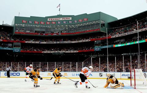 BOSTON, NY – JANUARY 01: Claude Giroux #28 of the Philadelphia Flyers is stopped on a breakaway by Tim Thomas #30 of the Boston Bruins during the 2010 Bridgestone Winter Classic at Fenway Park on January 1, 2010, in Boston, Massachusetts. (Photo by Jim McIsaac/Getty Images)