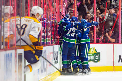 Vancouver Canucks Center Adam Gaudette (88) is congratulated after scoring a goal (Photo by Derek Cain/Icon Sportswire via Getty Images)