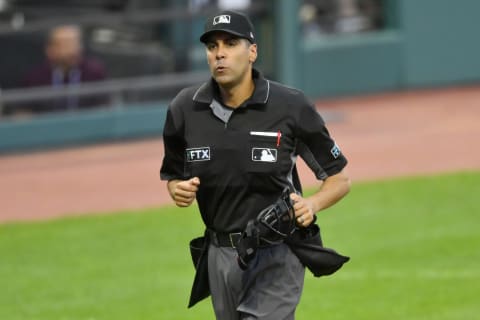 Home plate umpire Gabe Morales (47) runs on the field during a game. Mandatory Credit: David Richard-USA TODAY Sports