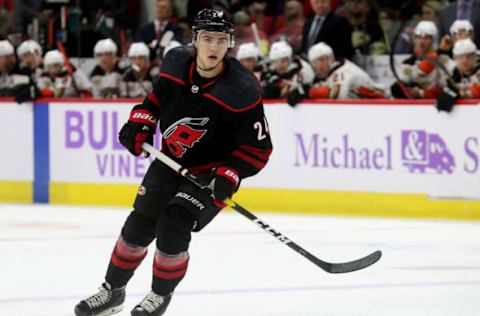 RALEIGH, NC – NOVEMBER 30: Jake Bean #24 of the Carolina Hurricanes skates for position during an NHL game against the Anaheim Ducks on November 30, 2018 at PNC Arena in Raleigh, North Carolina. (Photo by Gregg Forwerck/NHLI via Getty Images)