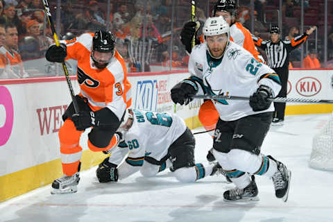 PHILADELPHIA, PA – OCTOBER 09: Radko Gudas #3 of the Philadelphia Flyers and Barclay Goodrow #23 of the San Jose Sharks race for the puck at the Wells Fargo Center on October 9, 2018 in Philadelphia, Pennsylvania. (Photo by Drew Hallowell/Getty Images)