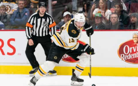 VANCOUVER, BC – FEBRUARY 22: Chris Wagner #14 of the Boston Bruins skates with the puck during NHL action against the Vancouver Canucks at Rogers Arena on February 22, 2020 in Vancouver, Canada. (Photo by Rich Lam/Getty Images)