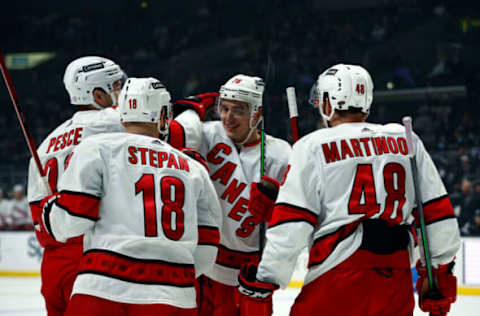 LOS ANGELES, CALIFORNIA – NOVEMBER 20: Derek Stepan #18 of the Carolina Hurricanes celebrates a goal against the Los Angeles Kings in the first period at Staples Center on November 20, 2021, in Los Angeles, California. (Photo by Ronald Martinez/Getty Images)