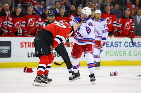 NEWARK, NJ – APRIL 01: New York Rangers left wing Brendan Lemieux (48) fights with New Jersey Devils left wing Miles Wood (44) during the second period of the National Hockey League game between the New Jersey Devils and the New York Rangers on April 1, 2019 at the Prudential Center in Newark, NJ. (Photo by Rich Graessle/Icon Sportswire via Getty Images)