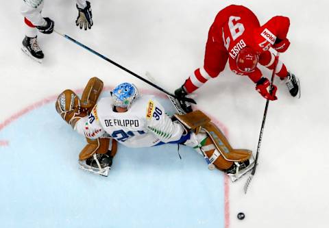 BRATISLAVA, SLOVAKIA MAY 15, 2019: Italy’s goaltender Marco de Filippo Roia defends against Russias Nikita Gusev in their 2019 IIHF Ice Hockey World Championship Preliminary Round Group B match at the Ondrej Nepela Arena; Russia won 10-0. Alexander Demianchuk/TASS (Photo by Alexander DemianchukTASS via Getty Images)