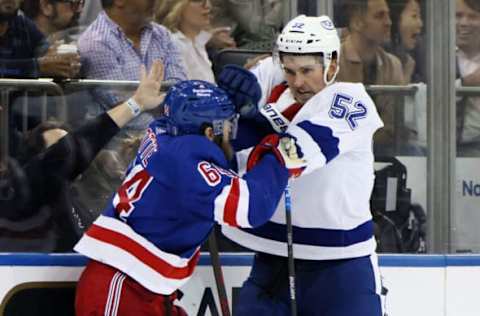 NEW YORK, NEW YORK – JUNE 03: Tyler Motte #64 of the New York Rangers fights with Cal Foote #52 of the Tampa Bay Lightning during the third period in Game Two of the Eastern Conference Final of the 2022 Stanley Cup Playoffs at Madison Square Garden on June 03, 2022, in New York City. (Photo by Bruce Bennett/Getty Images)