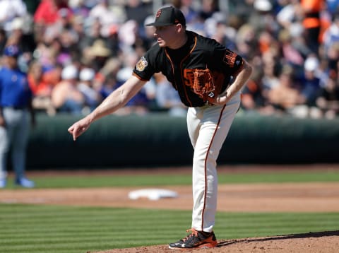 Feb 25, 2017; Scottsdale, AZ, USA; San Francisco Giants pitcher Mark Melancon throws in the fourth inning against the Chicago Cubs during a spring training game at Scottsdale Stadium. Mandatory Credit: Rick Scuteri-USA TODAY Sports