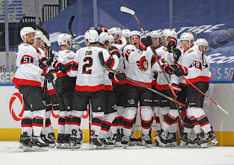 The Ottawa Senators celebrate their overtime victory. (Photo by Claus Andersen/Getty Images)