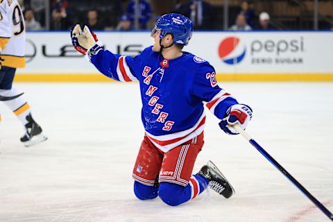 Dec 12, 2021; New York, New York, USA; New York Rangers defenseman Adam Fox (23) reacts after getting tripped against the Nashville Predators during the third period at Madison Square Garden. Mandatory Credit: Danny Wild-USA TODAY Sports