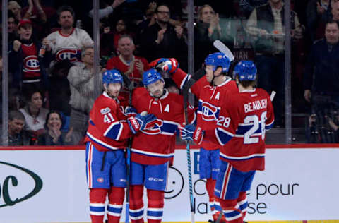 NHL Power Rankings: Montreal Canadiens forward Tomas Plekanec (14) reacts with teammates including Shea Weber (6) after scoring a goal against Calgary the Flames during the second period at the Bell Centre. Mandatory Credit: Eric Bolte-USA TODAY Sports