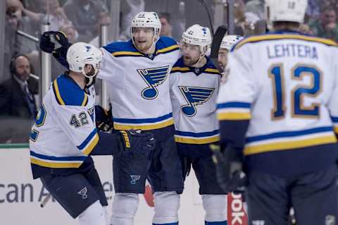 May 11, 2016; Dallas, TX, USA; St. Louis Blues center Patrik Berglund (21) celebrates with center David Backes (42), defenseman Colton Parayko (55), and center Jori Lehtera (12) after scoring a goal against the Dallas Stars during the first period in game seven of the second round of the 2016 Stanley Cup Playoffs at American Airlines Center. Mandatory Credit: Jerome Miron-USA TODAY Sports