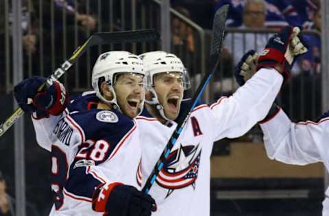 NEW YORK, NY – NOVEMBER 06: Oliver Bjorkstrand #28 of the Columbus Blue Jackets (l) ceebrates his goal at 8:01 of the third period against the New York Rangers and is joined by Boone Jenner #38 (r) at Madison Square Garden on November 6, 2017 in New York City. The Rangers defeated the Blue Jackets 5-3. (Photo by Bruce Bennett/Getty Images)