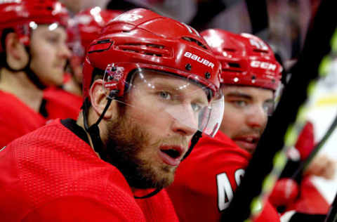 RALEIGH, NC – MARCH 30: Jordan Staal #11 of the Carolina Hurricanes watches action on the ice from the bench area during an NHL game against the Philadelphia Flyers on March 30, 2019 at PNC Arena in Raleigh, North Carolina. (Photo by Gregg Forwerck/NHLI via Getty Images)