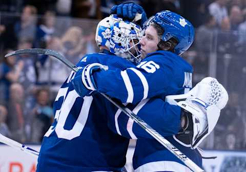 TORONTO, ON – JANUARY 04: Toronto Maple Leafs right wing Mitchell Marner (16) celebrates the win and congratulates Toronto Maple Leafs goaltender Michael Hutchinson (30) at the end of the third period in a game between the New York Islanders and the Toronto Maple Leafs on January 04, 2020, at Scotiabank Arena in Toronto, Ontario Canada. (Photo by Nick Turchiaro/Icon Sportswire via Getty Images)