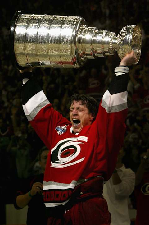 RALEIGH, NC – JUNE 19: Rod Brind’Amour #17 of the Carolina Hurricanes celebrates with the Stanley Cup after defeating the Edmonton Oilers in game seven of the 2006 NHL Stanley Cup Finals on June 19, 2006 at the RBC Center in Raleigh, North Carolina. The Hurricanes defeated the Oilers 3-1 to win the Stanley Cup finals 4 games to 3. (Photo by Dave Sandford/Getty Images)