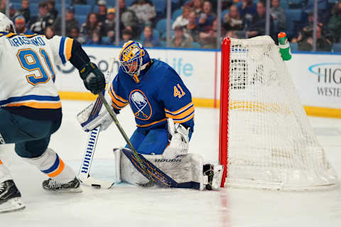 BUFFALO, NY – APRIL 14: Craig Anderson #41 of the Buffalo Sabres makes the save against Vladimir Tarasenko #91 of the St. Louis Blues during the first period at KeyBank Center on April 14, 2022 in Buffalo, New York. (Photo by Kevin Hoffman/Getty Images)