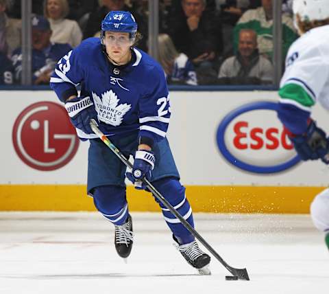 TORONTO, ON – FEBRUARY 29: Travis Dermott #23 of the Toronto Maple Leafs. The Maple Leafs defeated the Canucks 4-2. (Photo by Claus Andersen/Getty Images).