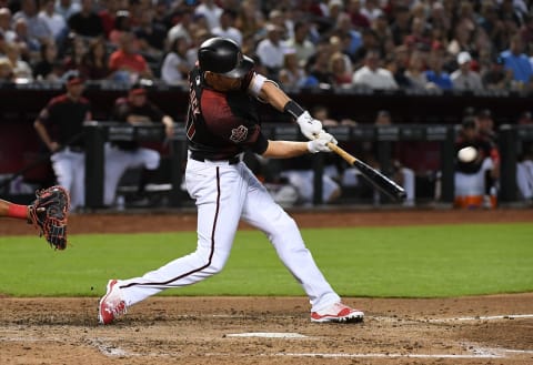 PHOENIX, AZ – MAY 12: AJ Pollock #11 of the Arizona Diamondbacks hits an RBI double during the third inning against the Washington Nationals at Chase Field on May 12, 2018, in Phoenix, Arizona. (Photo by Norm Hall/Getty Images)