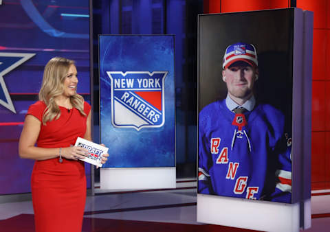 Alexis Lafreniere after his selection in the number one position by the New York Rangers (Photo by Mike Stobe/Getty Images)