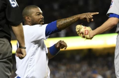 Kendrick Points Toward the Dugout to Challenge the Call. Photo by Richard Mackson – USA TODAY Sports.