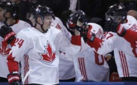 Sep 20, 2016; Toronto, Ontario, Canada; Team Canada forward Corey Perry (24) gets congratulated after his goal against Team USA during preliminary round play in the 2016 World Cup of Hockey at Air Canada Centre. Team Canada defeated Team USA 4-2. Mandatory Credit: John E. Sokolowski-USA TODAY Sports