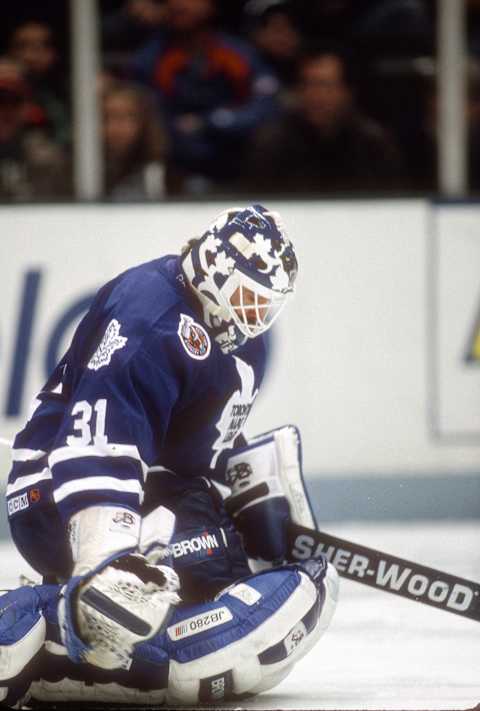 EAST RUTHERFORD, NJ – CIRCA 1992: Grant Fuhr #31 of the Toronto Maple Leafs defends his goal against the New Jersey Devils during an NHL Hockey game circa 1992   (Photo by Focus on Sport/Getty Images)