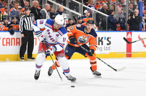 EDMONTON, AB – MARCH 11: Connor McDavid #97 of the Edmonton Oilers pursues Marc Staal #18 of the New York Rangers on March 11, 2019 at Rogers Place in Edmonton, Alberta, Canada. (Photo by Andy Devlin/NHLI via Getty Images)