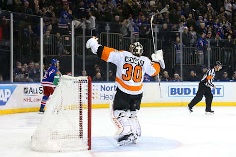 NEW YORK, NY – DECEMBER 23: Michal Neuvirth #30 of the Philadelphia Flyers reacts after his team defeats the New York Rangers in a shootout at Madison Square Garden on December 23, 2018 in New York City. (Photo by Jared Silber/NHLI via Getty Images)