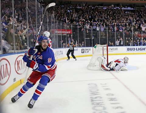 NEW YORK, NEW YORK – MARCH 05: Mika Zibanejad #93 of the New York Rangers scores his fifth goal of the game in overtime to defeat Ilya Samsonov #30 and the Washington Capitals 5-4 at Madison Square Garden on March 05, 2020 in New York City. (Photo by Bruce Bennett/Getty Images)