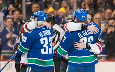 The Sedin Twins (Photo by Rich Lam/Getty Images)